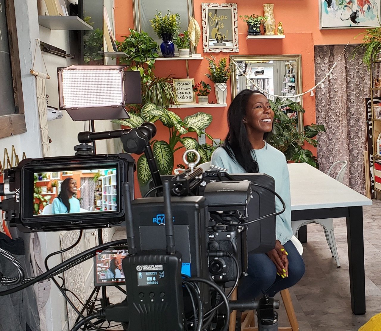 Camera and monitor rig set up for an interview inside a client's shop